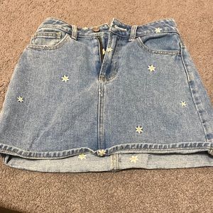 Jean skirt from pacsun with daisies on it size 23